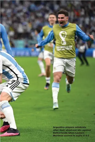  ?? ?? Argentina players celebrate after their shoot- out win against Netherland­s when Lautaro Martinez scored to make it 4- 3