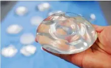  ?? AP PHOTO/DONNA MCWILLIAM ?? A silicone gel breast implant is seen at an Irving, Texas, manufactur­ing facility in 2006. Friday U.S. health officials said they will convene a public meeting of medical advisers in 2019 on the safety of breast implants.