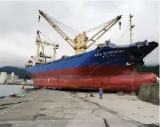  ??  ?? The cargo ship Asia Symphony was pushed onto the harbour wall in Kamaishi port by the tsunami in 2011