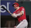  ?? TONY GUTIERREZ – THE ASSOCIATED PRESS ?? Mike Trout homered on Tuesday night but the Angels lost after a rough eighth inning.