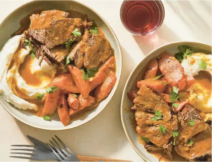  ?? JULIA GARTLAND/THE NEW YORK TIMES PHOTOS ?? Brisket or chuck can be used for a beef stew made like traditiona­l pot roast, such as this Jewish American pot roast, with lots of onions and carrots.