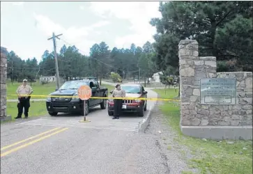  ?? Dylan Taylor-Lehman Alamogordo Daily News ?? SECURITY GUARDS are stationed last week at the entrance to the Sunspot Solar Observator­y to turn away visitors curious about the site’s recent closure over an undisclose­d security concern in Sunspot, N.M.