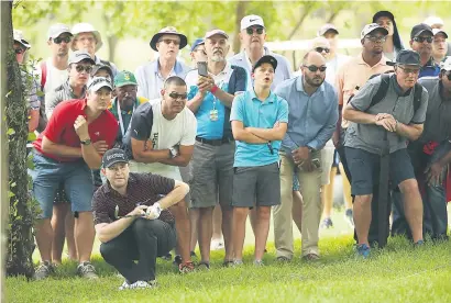  ?? Picture: Gallo Images ?? BEADY EYE. South Africa’s Branden Grace lines up a shot in the rough on the opening day of the SA Open at Glendower Golf Club yesterday.