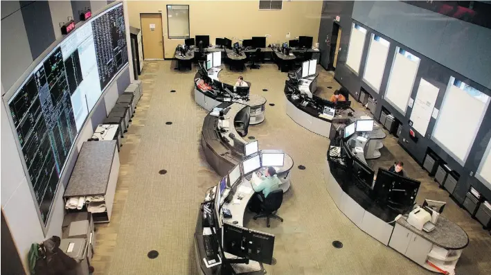  ?? PHOTOS: TED RHODES/POSTMEDIA NEWS ?? The control room of the Alberta Electric System Operator. The overall average demand for power in Alberta from Dec. 21, 2013 to March 20, 2014 was up four per cent from last winter.