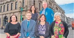  ??  ?? From left, front: Claire Wilson of Barnardo’s, Councillor Callum Purves, Jacquie Pepper, deputy director of education and children’s services, and Sharon Cooper, education and children’s services. Back: Liz Nolan of Aberlour Childcare Trust and...