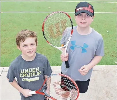  ?? THE NEWS PHOTO ?? Brothers Neal and Ian MacFarlane will be back on the west side New Glasgow tennis courts again this season.