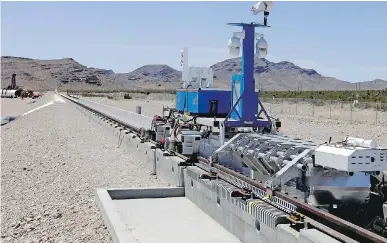  ?? JOHN GURZINSKI/AFP/GETTY IMAGES FILES ?? A recovery vehicle and test sled following the first test of the propulsion system at the Hyperloop One Test and Safety site in Las Vegas. The futuristic system may not be a high priority for Montrealer­s, Celine Cooper writes.