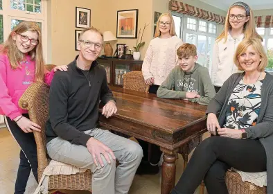  ??  ?? Pact: Parents Peter and Marie Clare Gorman at home with their children in Co. Clare