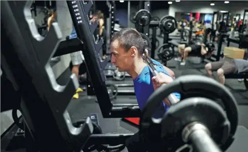  ?? REUTERS FILE ?? Modern fitness regimens rely heavily on nutritiona­l informatio­n. Across China, many fitness devotees are rethinking the way they prepare traditiona­l dishes in order to cut back on fats and sugar.