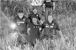  ?? COURTESY ?? Martin County sheriff’s deputies escort Richard St. Leger, of Pompano Beach, after he was captured following a high-speed chase that began in Orlando on Monday.