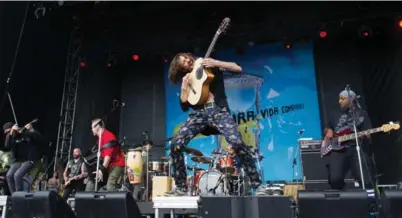  ?? EMMA MCINTYRE/GETTY IMAGES FILE PHOTO ?? Eugene Hutz performed last year with Gogol Bordello at the TURF festival. Of Monsters and Men, UB40 and Wilco are among the main players this year.