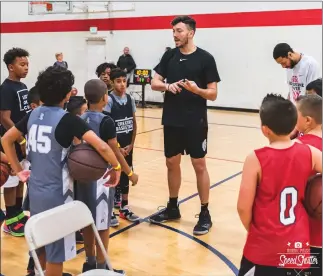  ?? Photo courtesy Sal Cabrera ?? Golden Valley alumnus and pro basketball player Taylor Statham, center, hosted a 3x3 basketball tournament at the Santa Clarita Athletic Club on Saturday.