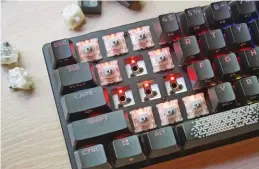  ?? ?? Switching out the keycaps is a popular and easy keyboard mod.