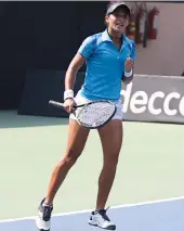  ??  ?? India’s Ankita Raina celebrates after beating Yulia Putintseva of Kazakhstan in their Fed Cup Asia/ Oceania group tie in New Delhi on Thursday.