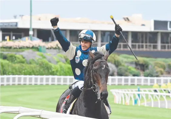  ??  ?? An ecstatic Glen Boss after riding Irish import Sir Dragonet to victory in the Cox Plate at Moonee Valley on Saturday. Picture: SDP Media