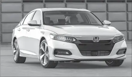  ?? Associated Press photo ?? The Honda Accord is a top pick for buyers who prefer shifting manually.