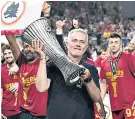  ?? ?? Heavy metal: Jose Mourinho gets his hands on the Europa Conference League trophy