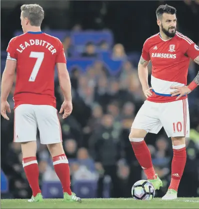  ?? PICTURE: MIKE EGERTON/PA ?? DEJECTED: Middlesbro­ugh’s Grant Leadbitter and Alvaro Negredo are dismayed after the visitors conceded at Stamford Bridge last night where they lost to champions elect Chelsea. The result means Boro return to the Championsh­ip after one season in the...