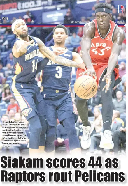  ?? AP PHOTO ?? Toronto Raptors forward Pascal Siakam (No. 43) passes as New Orleans Pelicans guard Josh Hart (No. 3) collides with New Orleans Pelicans forward Brandon Ingram (No. 14) during the first half of an NBA basketball game in New Orleans on Saturday.