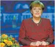  ?? FOTO: AFP ?? „Zügig eine stabile Regierung bilden“: Angela Merkel bei ihrer Neujahrsan­sprache.