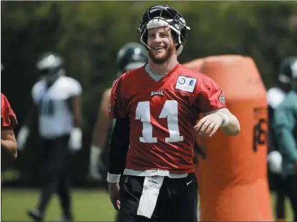  ?? MATT ROURKE — THE ASSOCIATED PRESS ?? Eagles quarterbac­k Carson Wentz is motivated by a burning desire to win a Super Bowl of his own.