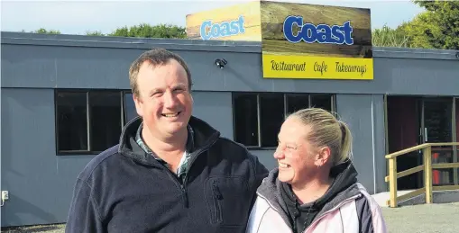  ?? PHOTO: HAMISH MACLEAN ?? ‘‘Please park outside’’ . . . When Wayne and Sarah Bugden reopen The Coast Cafe on Thursday — six months after a car smashed through the cafe walls and into the dining area — the Kakanui couple are asking patrons to ‘‘please park outside’’.