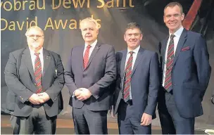  ??  ?? From left, Austin Davies, trustee, First Minister Carwyn Jones, Cory president Morgan Jones and Cory musical director Phillip Harper at the St David Awards Nomination­s