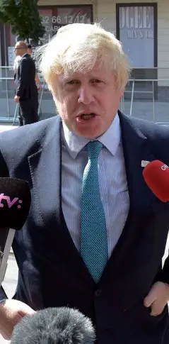  ??  ?? APPLE ISSUE: Britain’s Foreign Secretary Boris Johnson talks to media before a meeting of EU foreign ministers in Bratislava, Slovakia on Friday. Photo: Hans Punz