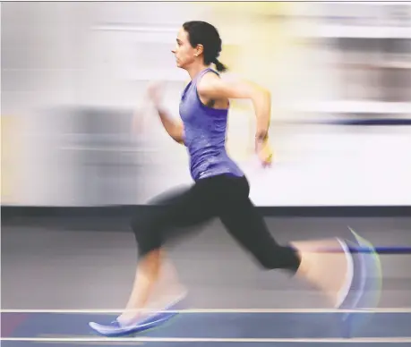  ?? DAN JANISSE ?? Registered nurse Noelle Montcalm works out on Tuesday at the St. Denis Centre. The St. Joseph’s grad, who ran the 400-metre hurdles at the 2016 Olympics in Rio, is preparing for this summer’s Tokyo Olympics and worries coronaviru­s concerns could result in the Games being cancelled.