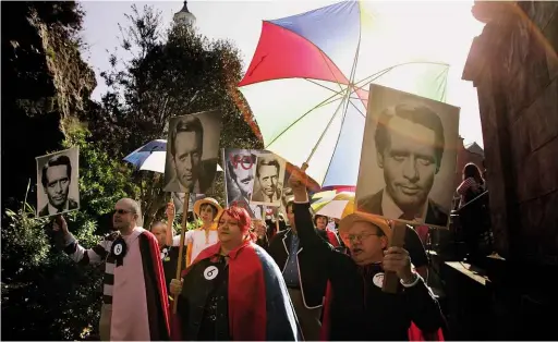  ??  ?? Prisoner fans re-enact the election in ‘Free for All’ on the show’s 40th anniversar­y celebratio­ns in Portmeirio­n in 2007.