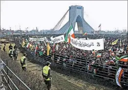  ?? EBRAHIM NOROOZI/AP ?? Iranians take part in a government-sanctioned rally in Tehran on Sunday to mark the anniversar­y of the 1979 Islamic Revolution. Some in the crowd told Western journalist­s that they also marched in the economic protests that jolted the nation last month.