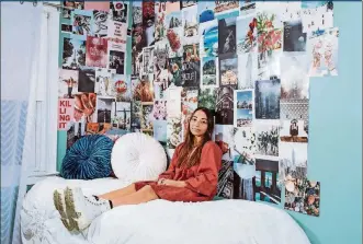  ?? PHOTOS BY MICHELLE GUSTAFSON/THE NEW YORK TIMES ?? Sierra Palantino in her bedroom in Philadelph­ia on Feb. 27. Magazine tear sheets and personal photos have been replaced by color-coordinate­d collage kits.