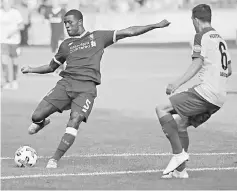  ??  ?? Liverpool’s Georginio Wijnaldum (left) scores the second goal during a pre-season friendly match against Hertha Berlin in Berlin, Germany in this July 29 file photo. — Reuters