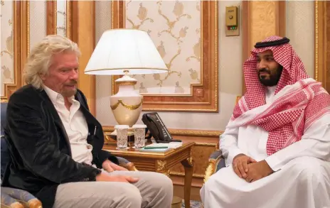  ??  ?? Richard Branson, with the Crown Prince, has also agreed to join the board of the Saudi Red Sea tourism project