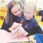  ??  ?? Shawnnie Prince and son Kaden participat­e in programs offered at the Ontario Early Years Centre at Angela’s Place.