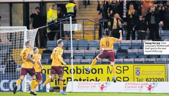  ??  ?? Jump for joy Chris Long earns Motherwell their spot in the next round of the cup