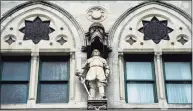  ?? Kassi Jackson / Associated Press ?? A statue of Maj. John Mason, leader of the 1637 massacre of Pequot Tribe members at Mystic, stands in a niche on the third-floor exterior of the state Capitol in Hartford.