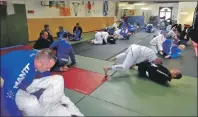  ??  ?? Oban BJJ members working hard at their recent seminar.