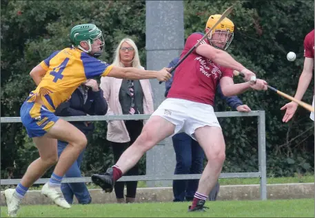  ??  ?? Jack O’Connor of Gusserane attempts to block the shot of Colin Kennedy (Liam Mellows).