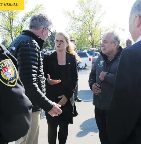  ?? SEAN KILPATRICK / THE CANADIAN PRESS ?? Gov. Gen. Julie Payette visits tornado-damaged communitie­s on Monday with Ottawa Mayor Jim Watson.