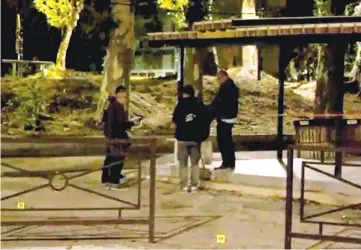  ??  ?? Police officers work at the scene of the shooting in front of a mosque, in this still image from video, in Avignon. — Reuters photo