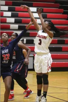  ??  ?? KeKe Turner puts up a shot from inside the paint against Sandy Creek.