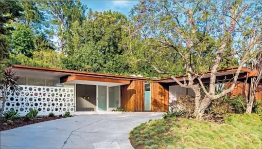  ?? Mark Singer ?? Photograph­s by FILM PRODUCER Vincent Sieber bought this 1950s home in Nichols Canyon five years ago. He’s asking $2.995 million for it.