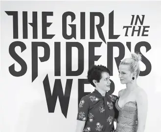  ?? — Gambar AFP ?? WATAK UTAMA: Gambar fail bertarikh 11 Jun 2018 ini menunjukka­n Claire Foy (kiri) dan Sylvia Hoeks bergambar bersama semasa sesi promosi filem ‘The Girl in the Spider’s Web’ di Barcelona.