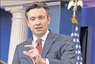  ?? AP ?? Josh Earnest answering questions from the press.