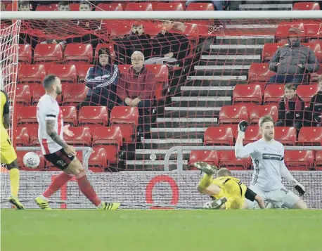  ??  ?? Liam Boyce puts Burton Albion ahead at the Stadium of Light.