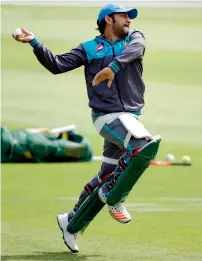  ?? Reuters ?? pakistan’s captain sarfraz ahmed tries his hand at bowling during nets ahead of the match against sri Lanka. —