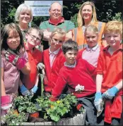  ??  ?? Pupils from St Peter’s CE Primary Academy with (back from left) Christine Pearson, Peter Folwell and Kim Burns