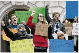  ?? RALPH BARRERA / AMERICAN-STATESMAN ?? In February, protesters gathered outside the University of Texas College of Pharmacy to demand that school officials sanction pharmacy professor Richard A. Morrisett. About 35 protesters marched from the pharmacy college to the UT Tower with signs,...