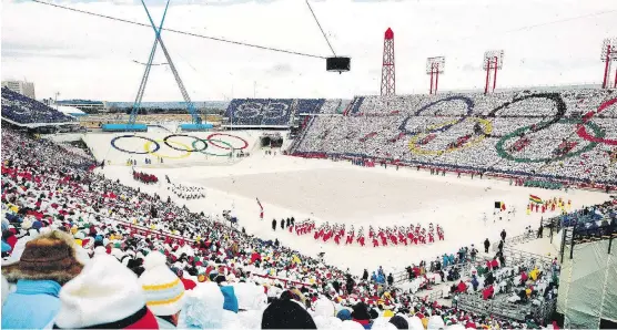  ?? KODAK CANADA FILE PHOTO TWIN CHECK ?? Canada’s delegation of athletes at McMahon Stadium during the opening ceremonies of the 1988 Winter Games. Calgary Bid Exploratio­n Committee spokesman Sean Beardow says he expects a webpage to go live in the coming weeks that will offer Calgarians...